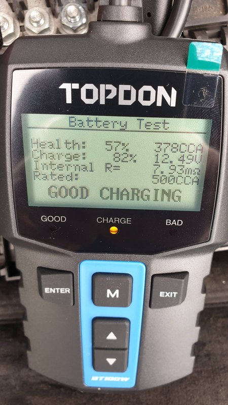 TOPDON battery tester screen showing voltage, state of charge, and battery health results