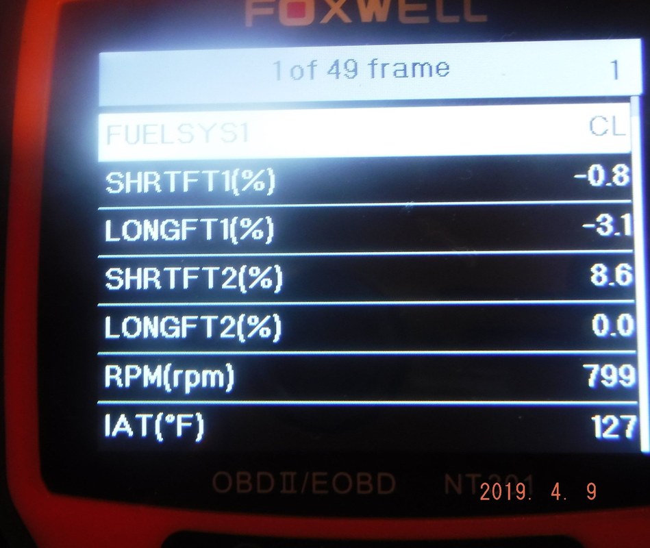 Foxwell NT301 scanner displaying fuel trim data for diagnosing a lean engine code