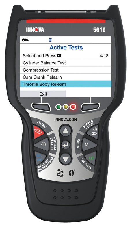 Innova 5610 scan tool connected to a vehicle dashboard for diagnostic trouble code and live data testing
