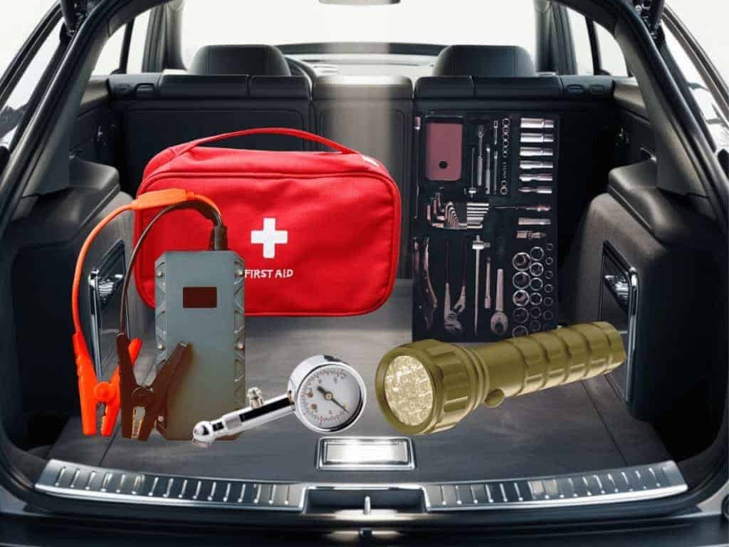 Tire iron, jack, and portable inflator arranged for roadside tire repair