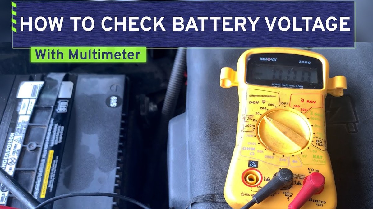 A digital multimeter connected to a car battery showing a reading of 12.6 volts.